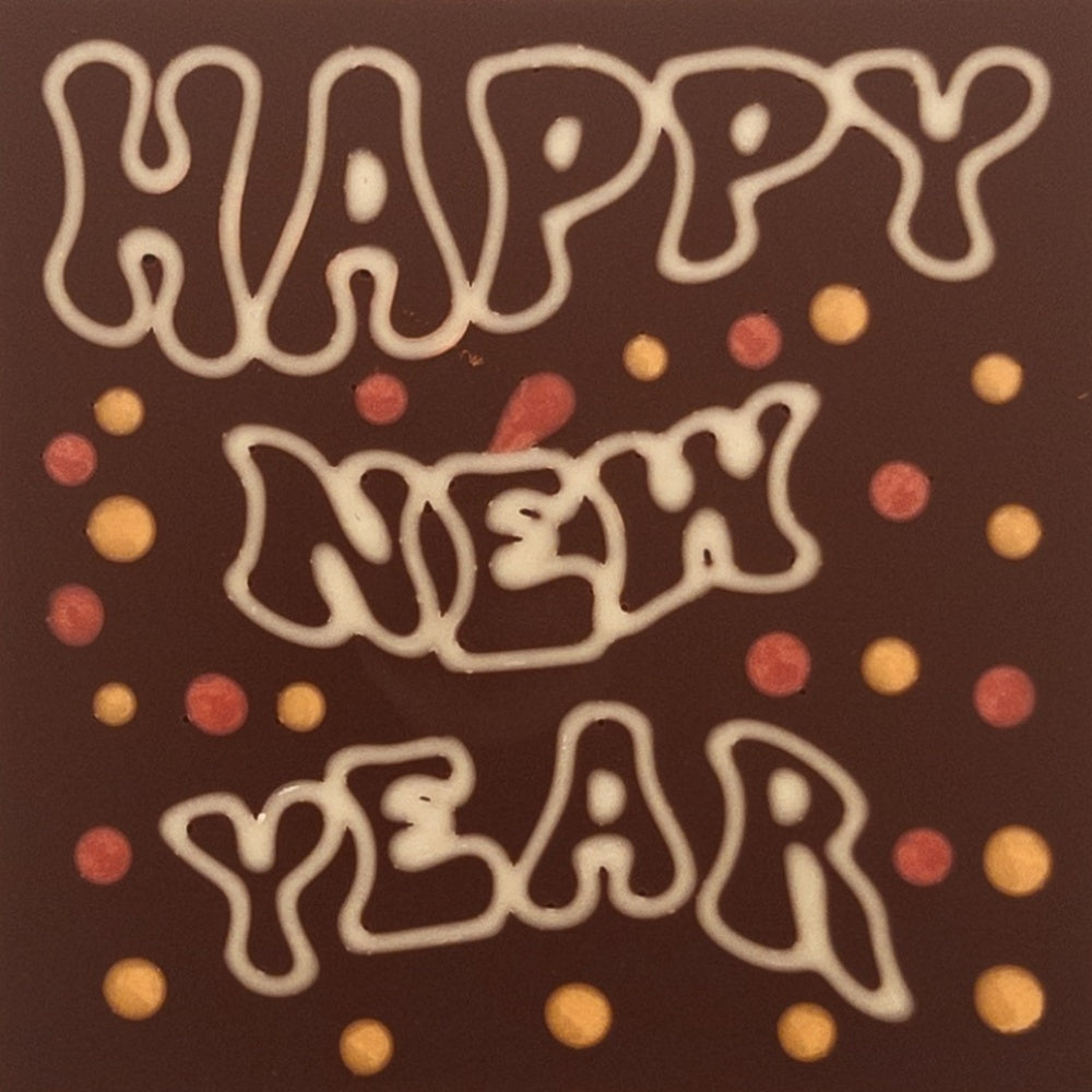 Happy New Year scris in ciocolata